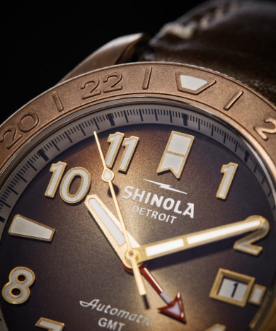 shinola bronze monster gmt close up of watch face