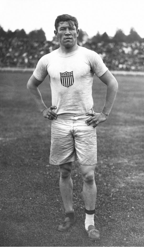 Jim Thorpe posing for a picture on an atheltic field