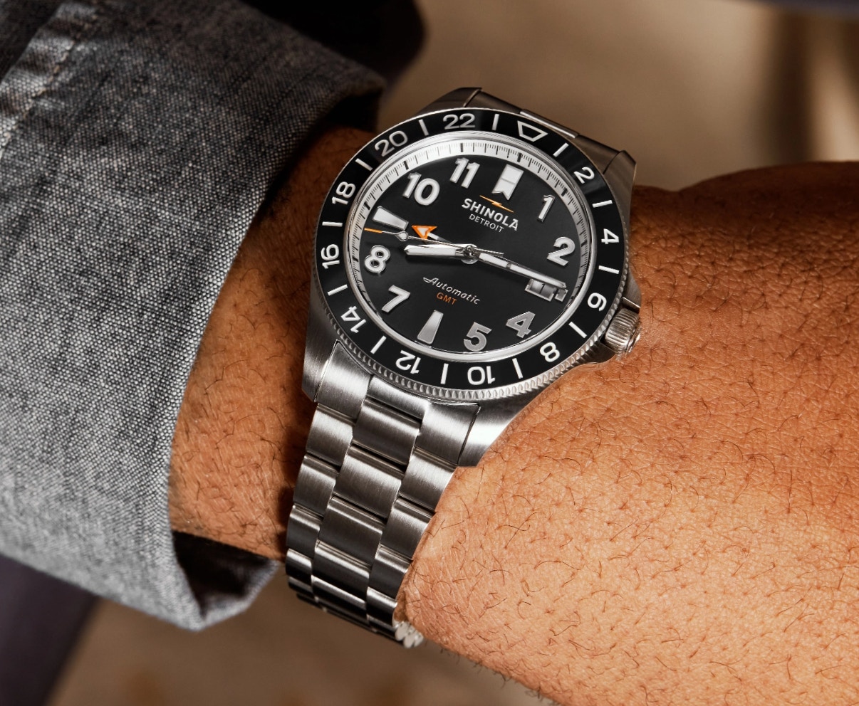 Person wearing a Shinola Monster GMT watch