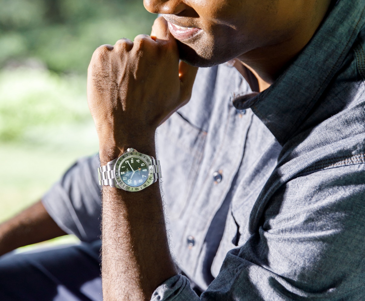 Person wearing a Shinola Monster GMT watch