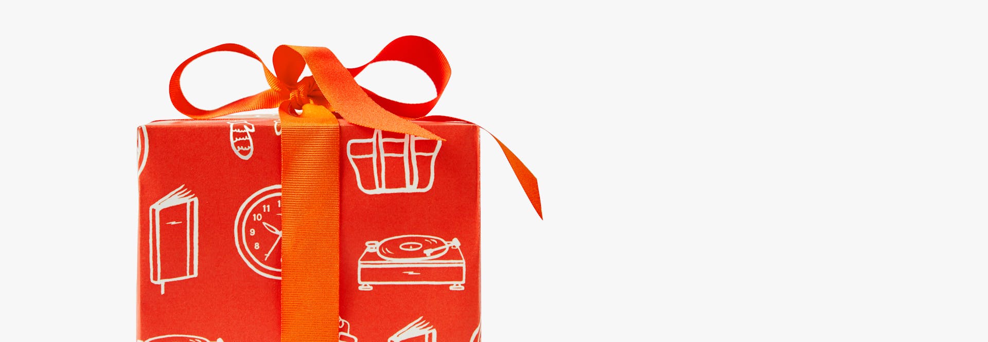 Box with gift-wrapping and ribbons and bows