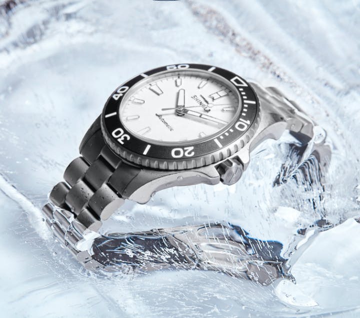 Ice Monster watch partially frozen in ice